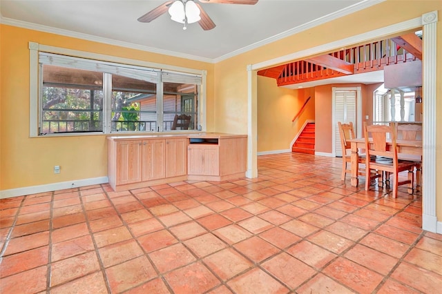 kitchen featuring light brown cabinetry, ceiling fan, ornamental molding, and light tile patterned flooring