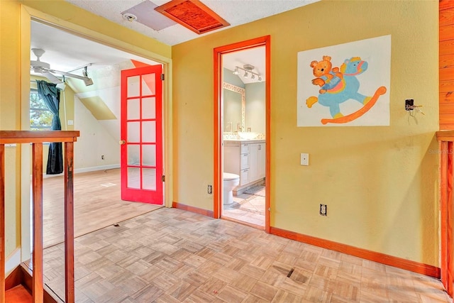 unfurnished room with parquet floors and lofted ceiling