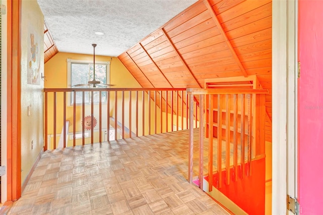 bonus room with wood ceiling, lofted ceiling, and parquet flooring