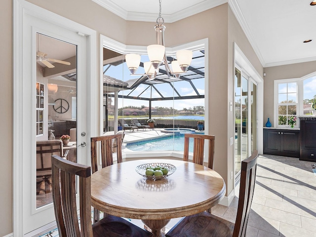 tiled dining room with ceiling fan with notable chandelier, ornamental molding, and french doors