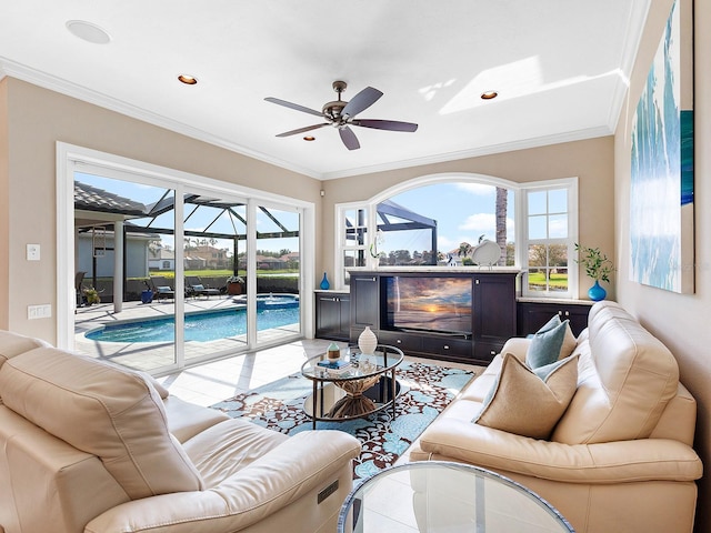 tiled living room featuring ceiling fan and ornamental molding