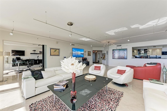 living room with light tile patterned floors