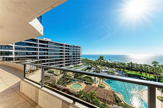 balcony featuring a water view