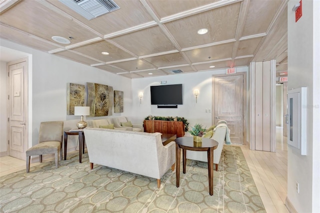 living room with coffered ceiling