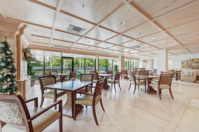 sunroom / solarium featuring coffered ceiling