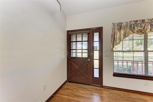 entryway with light wood-type flooring