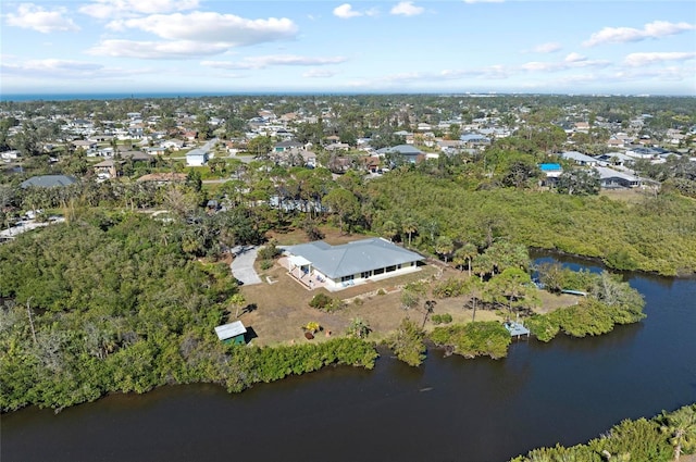 birds eye view of property featuring a water view and a residential view