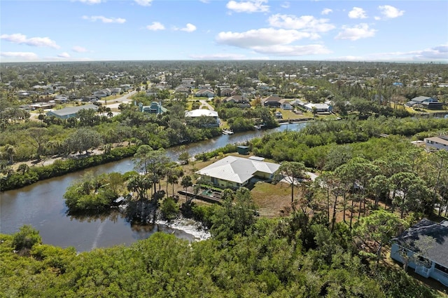 aerial view with a residential view and a water view