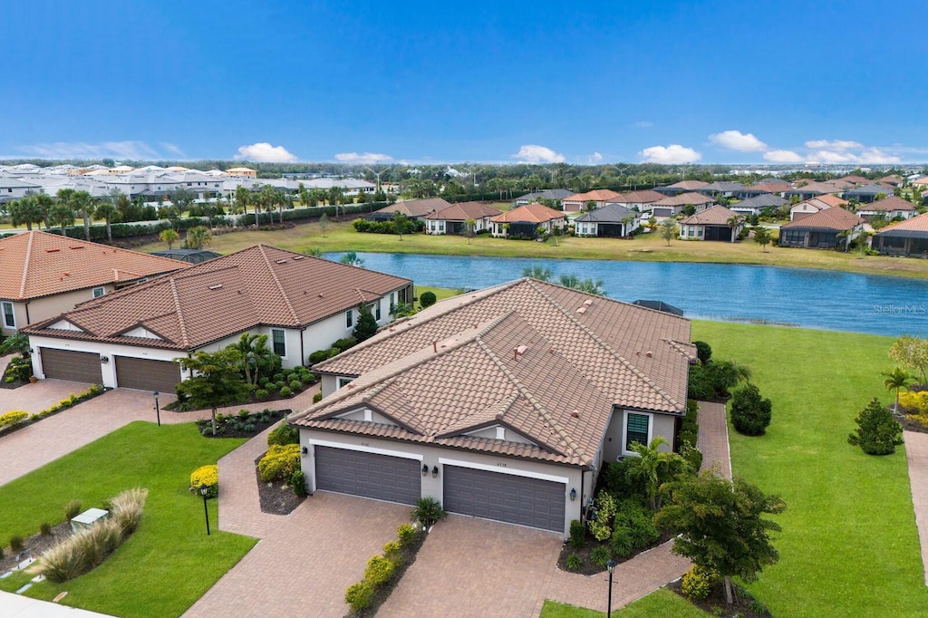 drone / aerial view featuring a water view