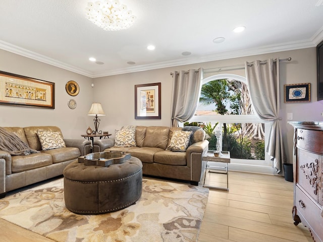 living room featuring ornamental molding and light hardwood / wood-style floors