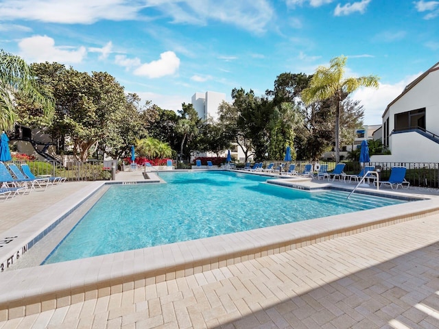 view of pool featuring a patio