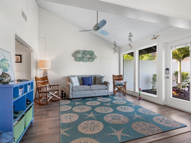 sunroom featuring lofted ceiling, ceiling fan, and wood ceiling