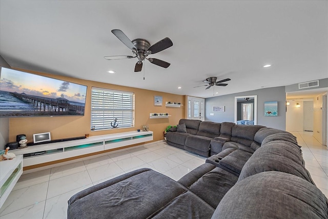 living room with ceiling fan