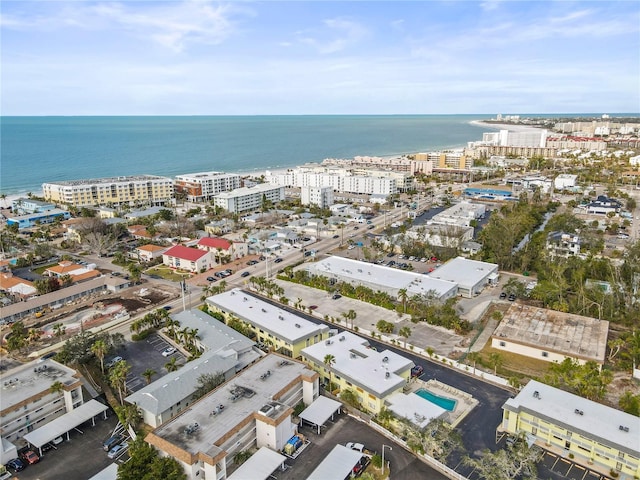 bird's eye view featuring a water view and a city view