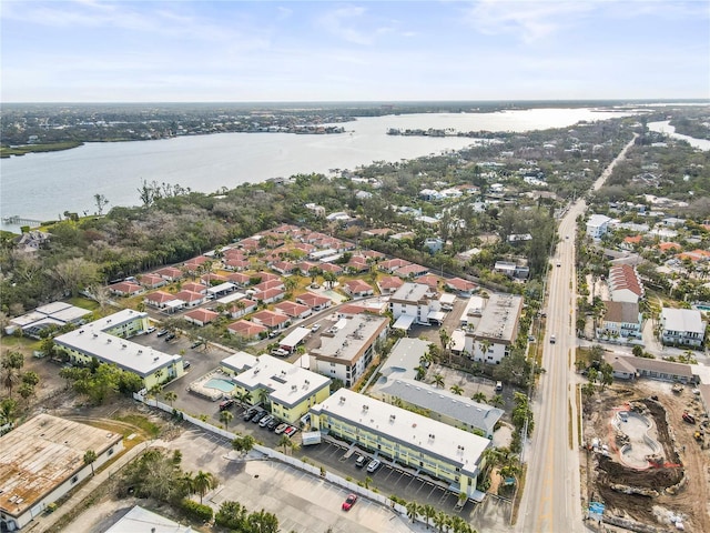 drone / aerial view with a water view