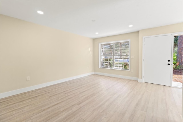 empty room with light wood-type flooring