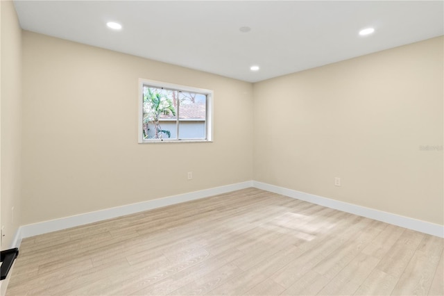 empty room featuring light hardwood / wood-style floors