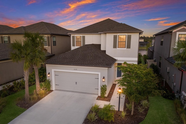 view of front of property with a garage