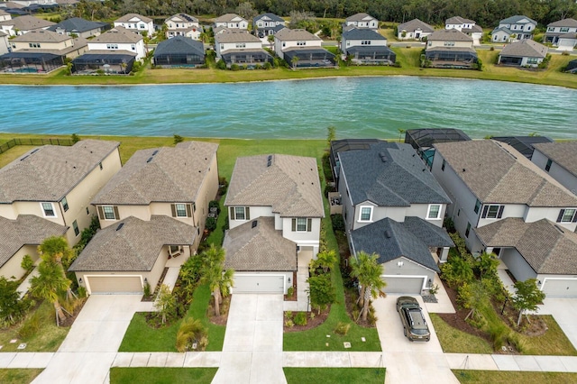 bird's eye view with a water view