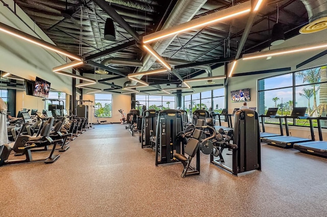 workout area featuring pool table and a high ceiling