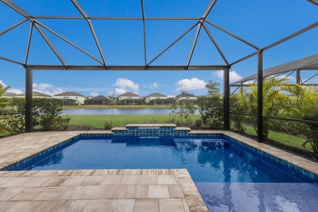 view of swimming pool featuring a water view, a patio, and glass enclosure