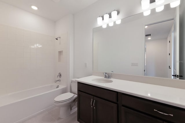 full bathroom with shower / washtub combination, vanity, tile patterned floors, and toilet