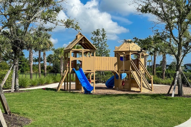 view of play area featuring a lawn