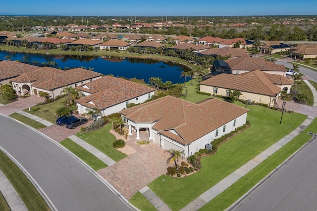 drone / aerial view featuring a water view