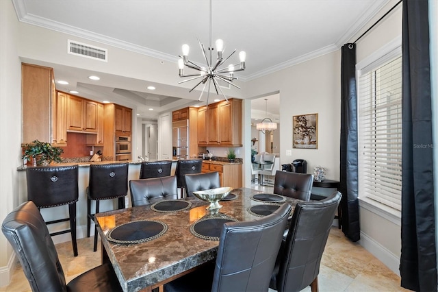 tiled dining space featuring crown molding and a notable chandelier