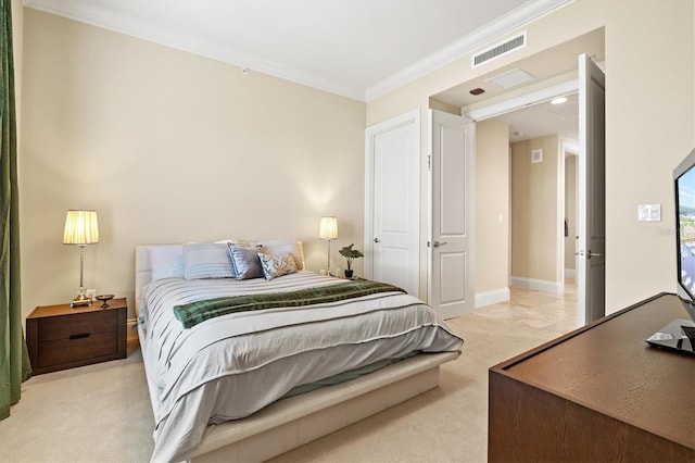 carpeted bedroom with ornamental molding