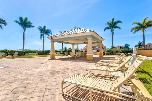 surrounding community with a gazebo and a patio