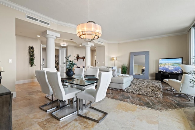 dining space with decorative columns, visible vents, baseboards, and ornamental molding