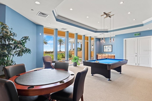 rec room with light carpet, visible vents, a raised ceiling, ornamental molding, and pool table