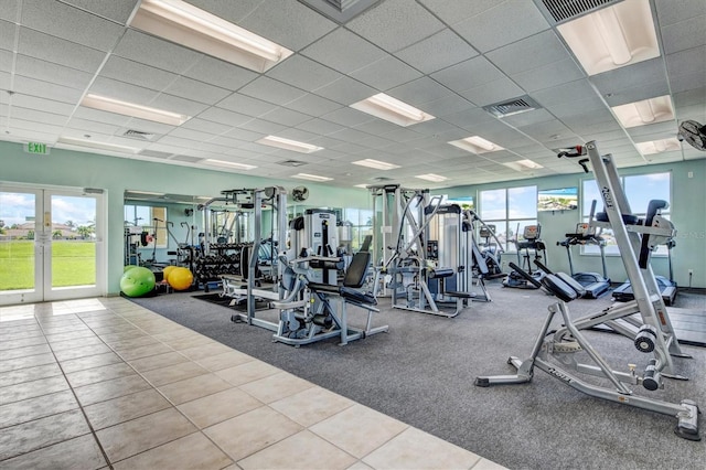 130 Riviera Dunes Way Unit 1104, Palmetto, FL 34221 - exercise room featuring visible vents, a drop ceiling, and french doors