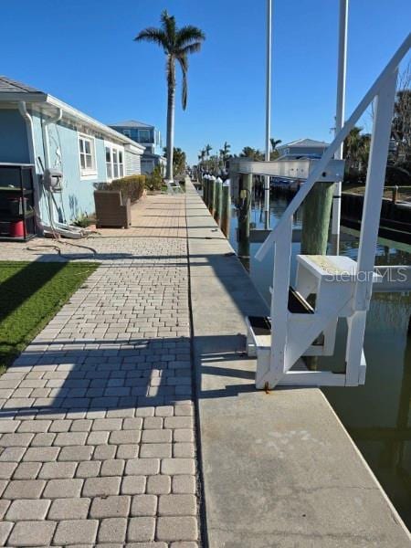 exterior space with a water view