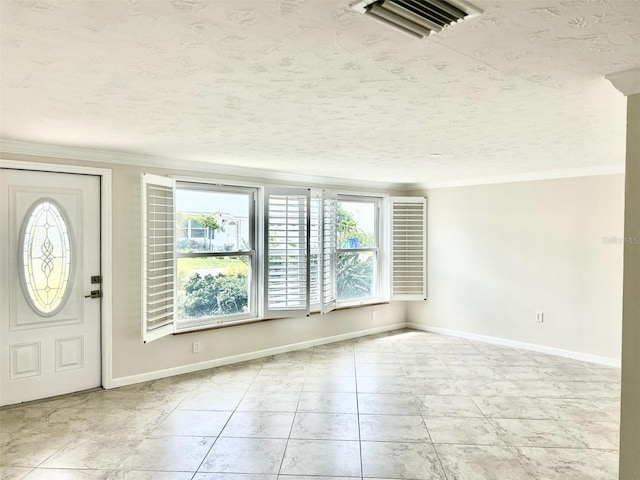 618 Jungle Queen Way, Longboat Key, FL 34228 - entrance foyer featuring plenty of natural light, ornamental molding, a textured ceiling, and light tile patterned floors