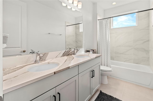 full bathroom with vanity, toilet, shower / bath combo, and tile patterned flooring