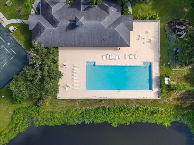 birds eye view of property featuring a water view