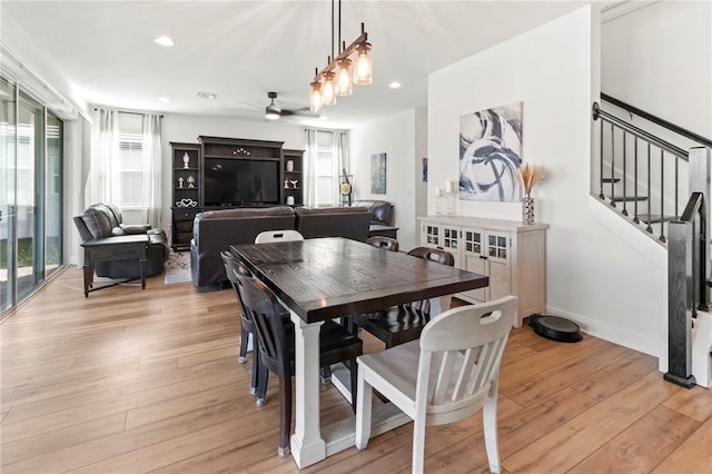 dining area with ceiling fan, light hardwood / wood-style flooring, and plenty of natural light