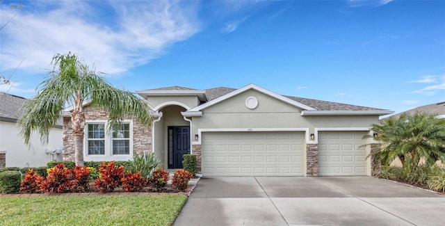 view of front of home with a garage