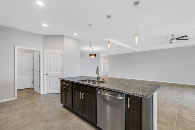 kitchen featuring dishwasher, stone counters, a center island with sink, hanging light fixtures, and ceiling fan