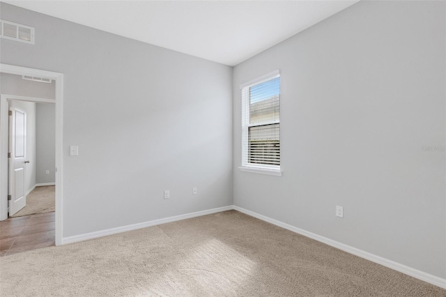 view of carpeted spare room