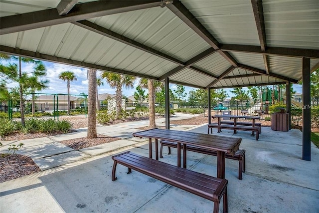 view of property's community with a gazebo and a patio