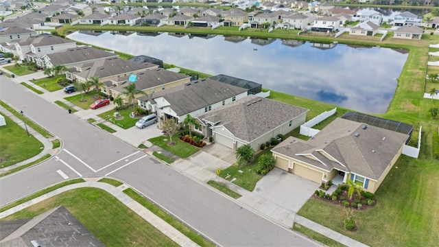 drone / aerial view featuring a water view