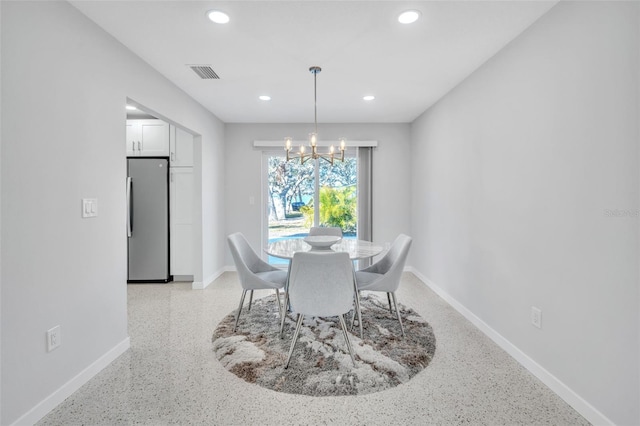 dining room featuring an inviting chandelier