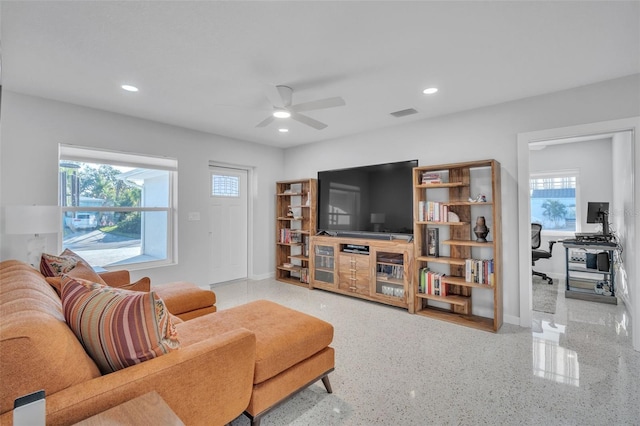 living room with ceiling fan