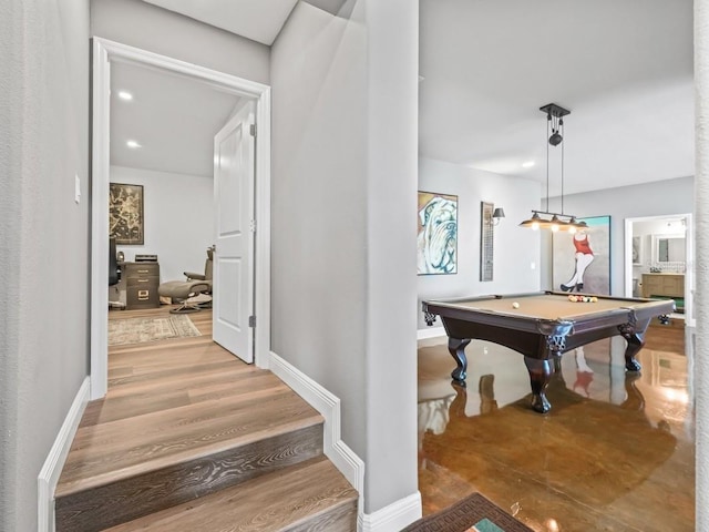 recreation room with hardwood / wood-style flooring and pool table