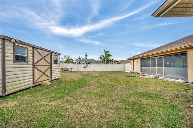 view of yard with a storage unit