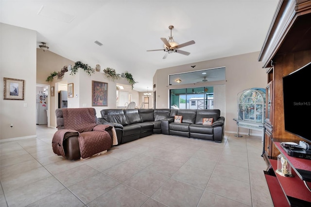 living room with light tile patterned floors, vaulted ceiling, and ceiling fan