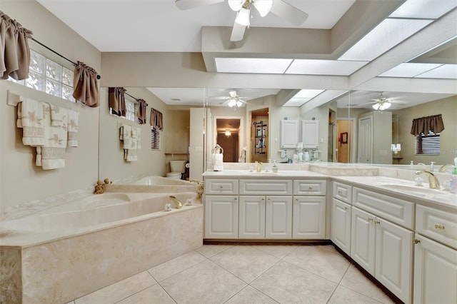 full bathroom with separate shower and tub, ceiling fan, tile patterned flooring, and vanity